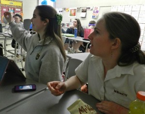Quiz Bowl member Emily Wolffe answers a question during practice.  Photo credit: Christina Hadley