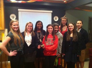 Mercy's Mock Trial team shows off their Honorable Mention trophy after their regional competition. Photo Credit: Ann Winn