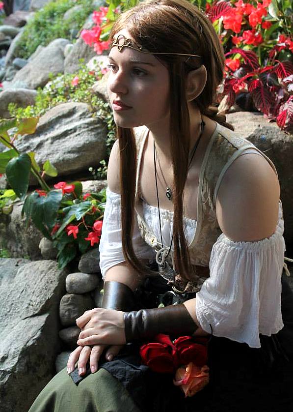 Her costume complete with elf ears, Emily Poppenger '14 watches passersby at Michigan's Renaissance Festival.  Photo Credit: Sergio Mazzotta