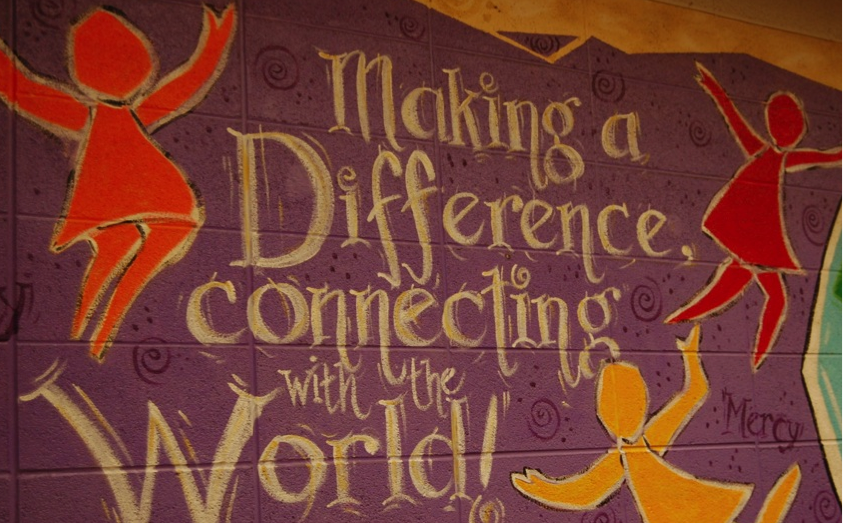 Vividly painted on a wall in the Mercy Media Center, a painting is a constant reminder of our service and our obligation to give back to the community.
