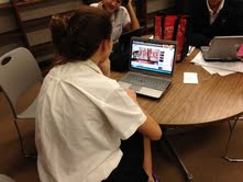 Junior Julia Swoish watches the "Blurred Lines" music video during an off hour.