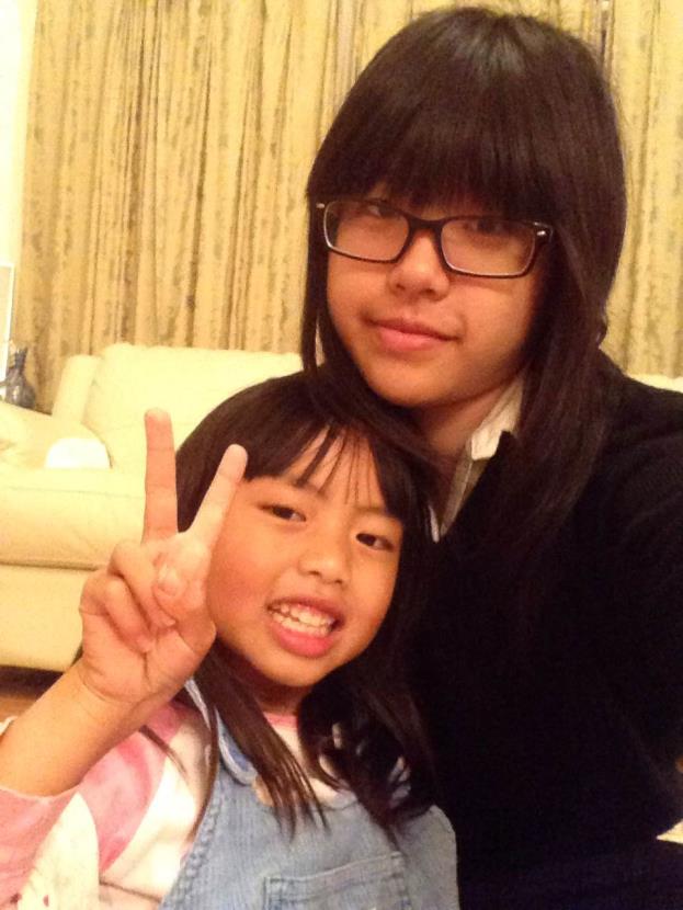 Siyi (top) hangs out and poses with her cousin (bottom). Photo Credit: Siyi Xu