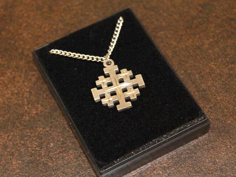 For many girls, receiving the signature Kairos cross pendant is a tangible sign of their faith. 