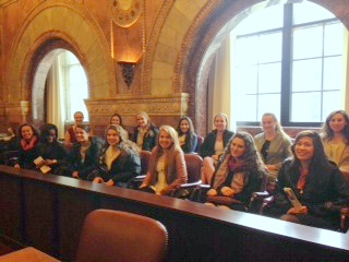 The AP Government Class sits inside of the famous "million dollar courtroom" adorned with various types of marble and mahogany.  Photo used with permission by Cindy Richter 