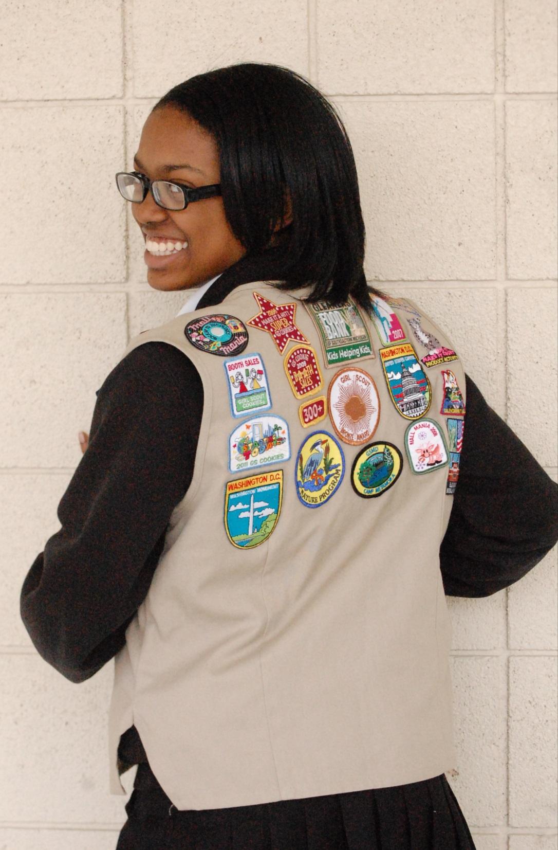 Williams, an Ambassador Girl Scout, has earned various patches recognizing achievements ranging from service at Gleaners Food Bank to selling over 300 boxes of Girl Scout cookies.